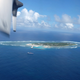 n this March 23, 2016, file photo, an aerial view is seen from a military plane carrying international journalists of the Taiwan-controlled Taiping island, also known as Itu Aba, in the Spratly archipelago, roughly 1600 kms. (1000 miles) in the South China Sea of southern Taiwan. Tensions in the South China Sea are rising, pitting China against smaller and weaker neighbors who all lay claim to a string of isles, coral reefs and lagoons, rich in fish and potential gas and oil reserves. (AP Photo/Johnson Lai, File)